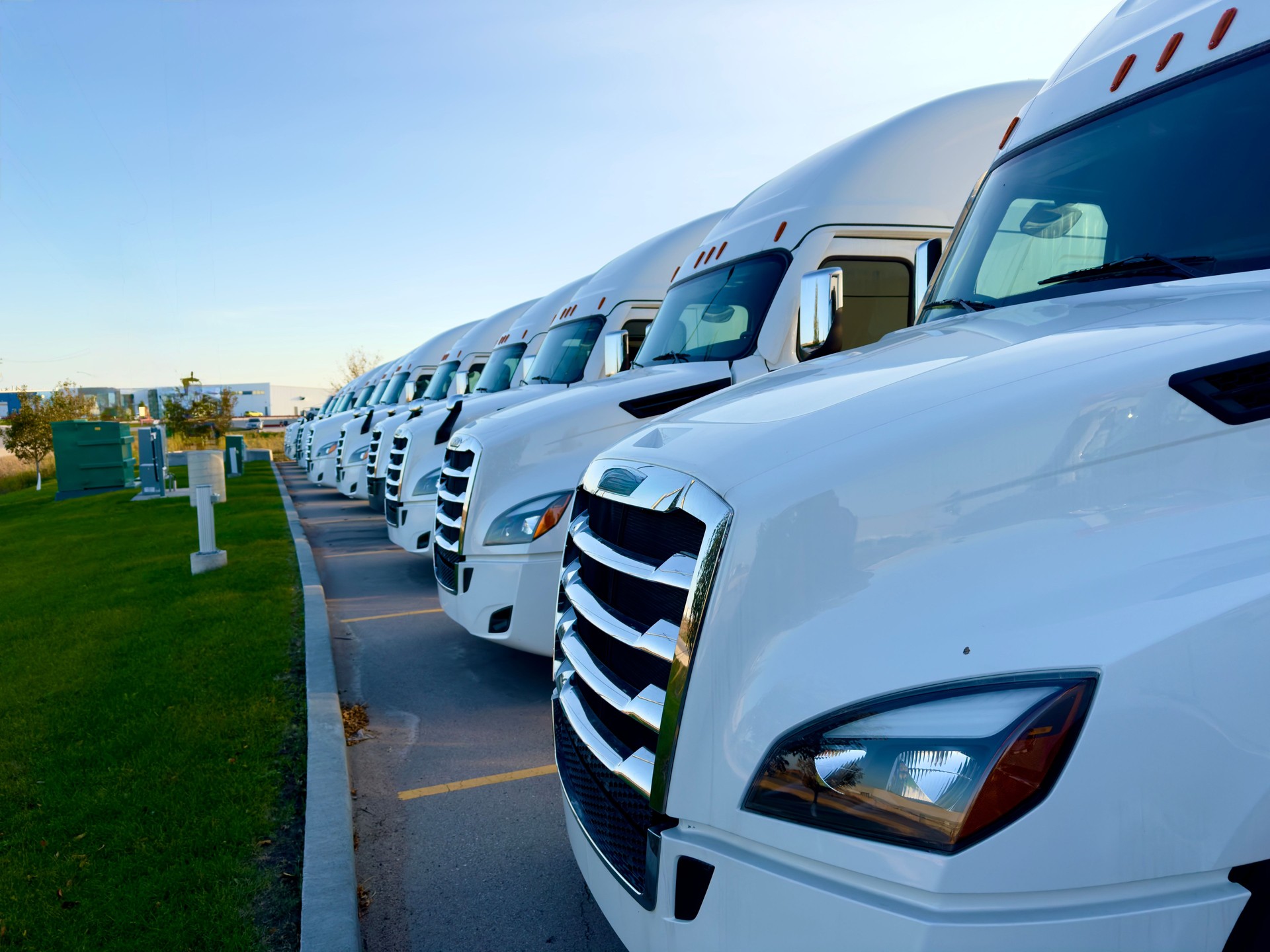 white trucks parking in the parking lot